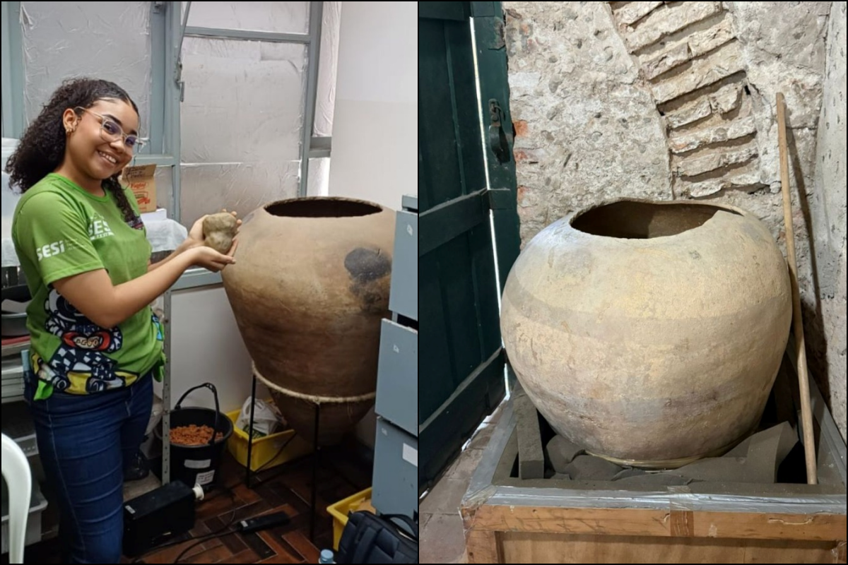 Estudante do SESI Candeias ao lado de urna funerária indígena de tradição Aratu, no Laboratório de Documentação e Arqueologia do Curso de Museologia (LADA) da UFRB. Foto: Arquivo Pessoal